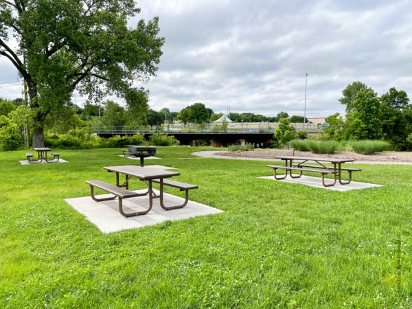 grills and picnic tables at the park