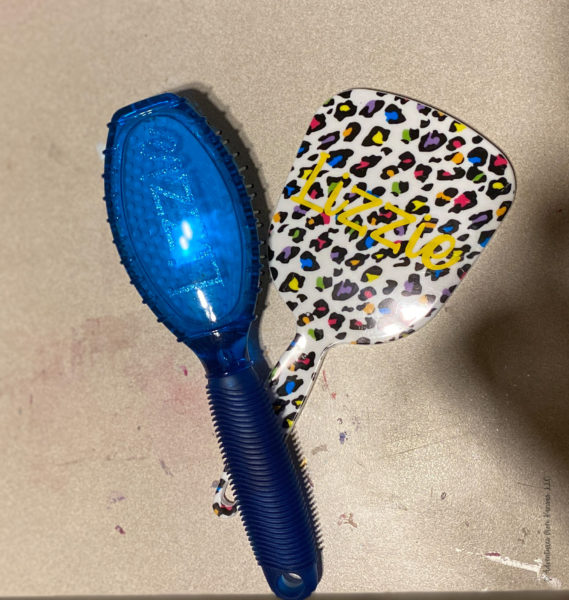 hairbrush and mirror with the a name on it