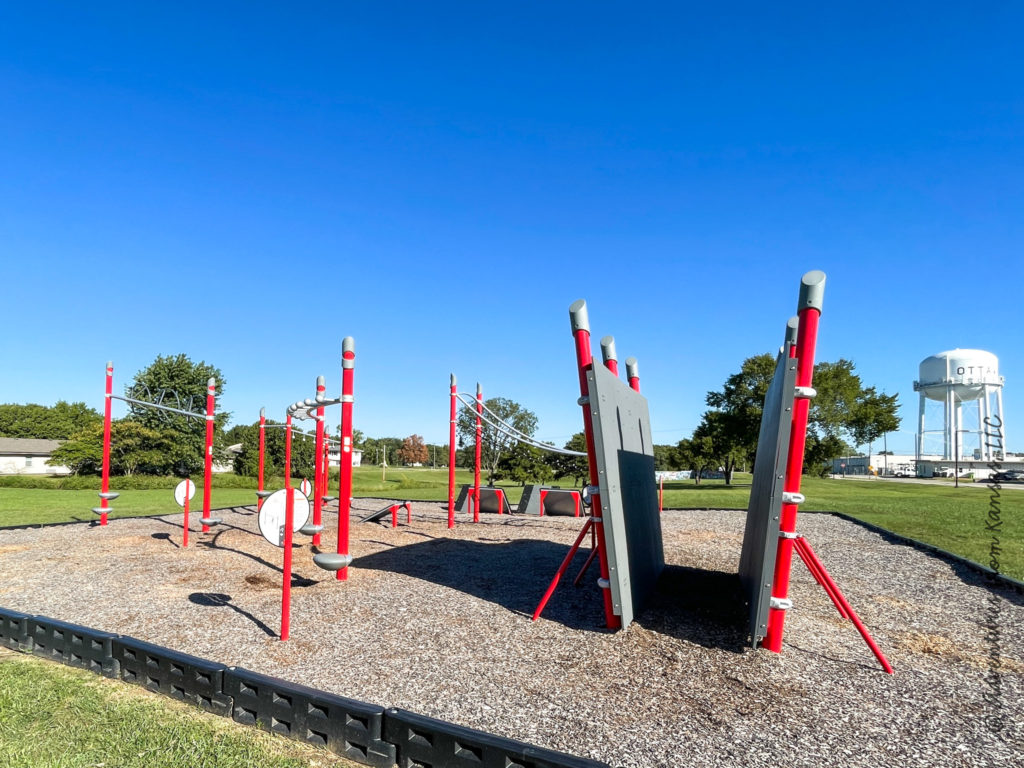 obstacle course playground for older kids with spider wall at park