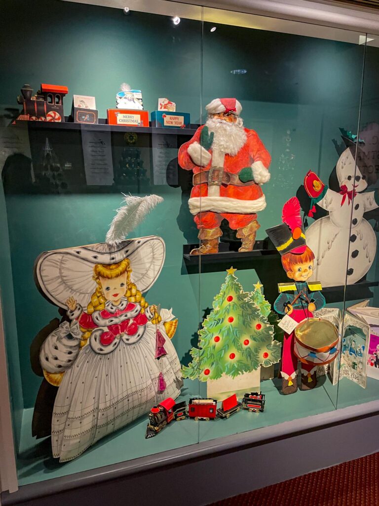 vintage christmas decorations of train, snowman, tree, Santa, angel