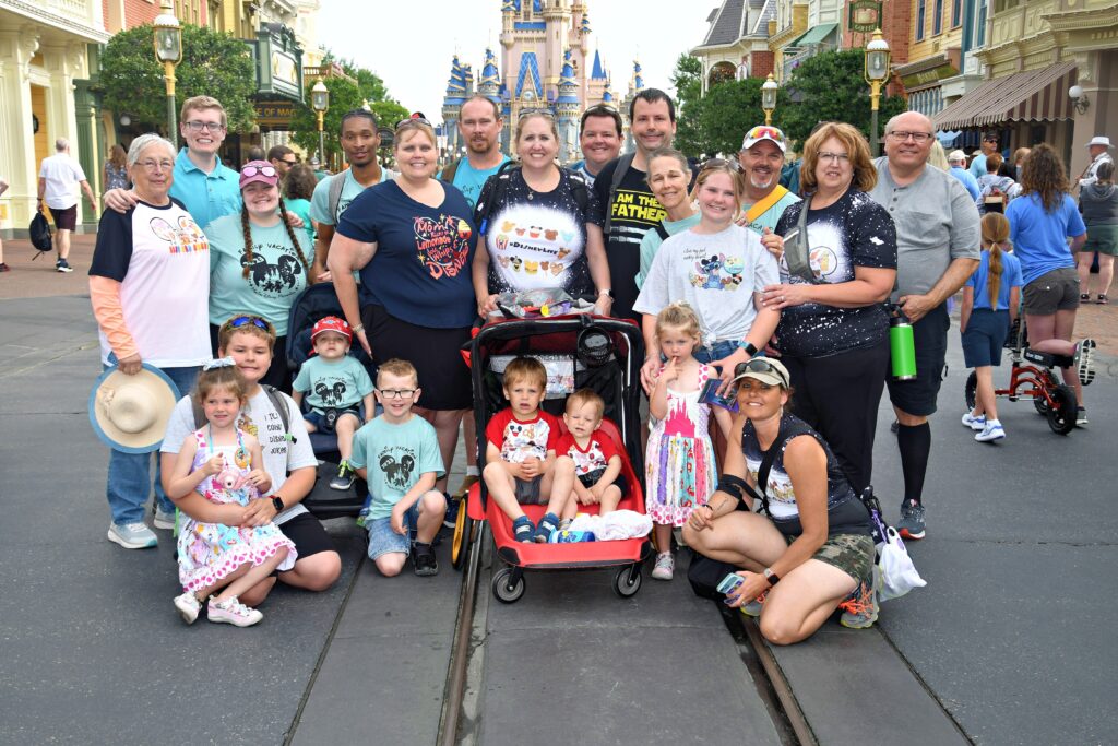 Large family group standing on Main Street at Walt Disney World.
