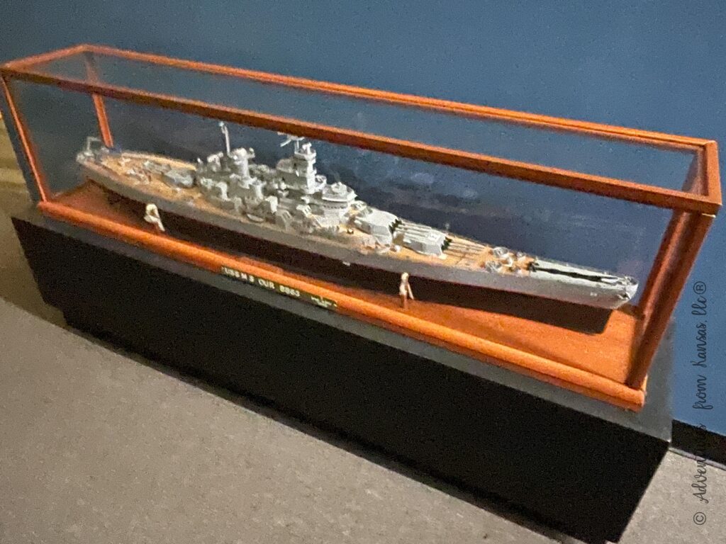 model of ship inside glass case